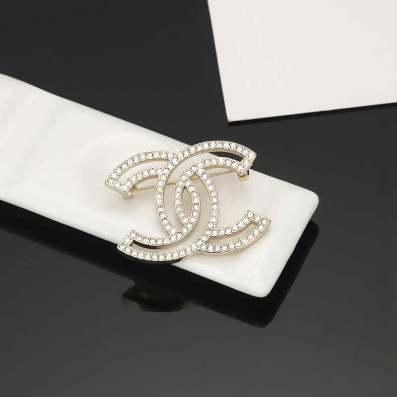 Ch**el brooches